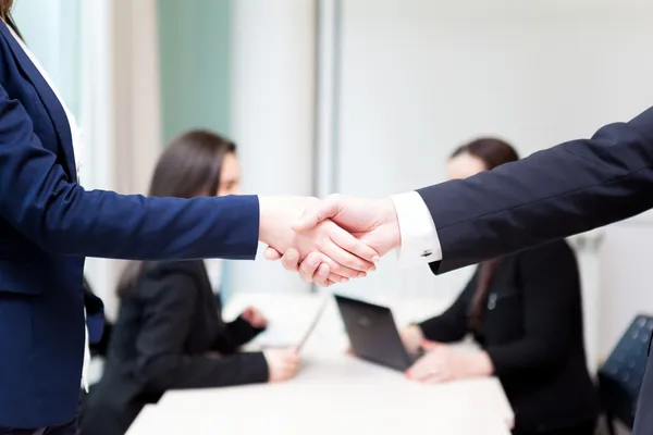 Business handshake at the office with bussiness — Stock Photo, Image