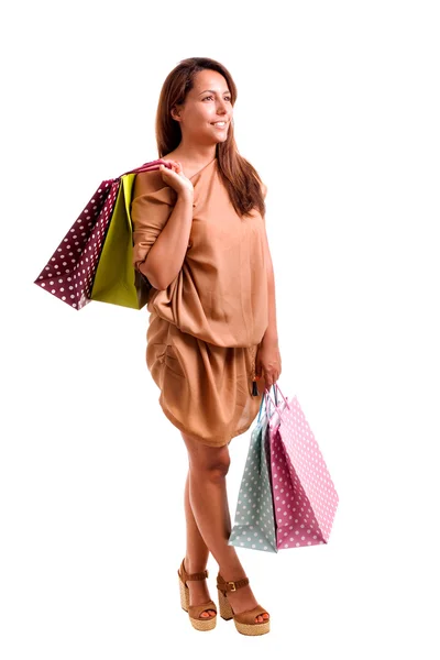 Mujer encantadora feliz con bolsas de compras sobre fondo blanco —  Fotos de Stock