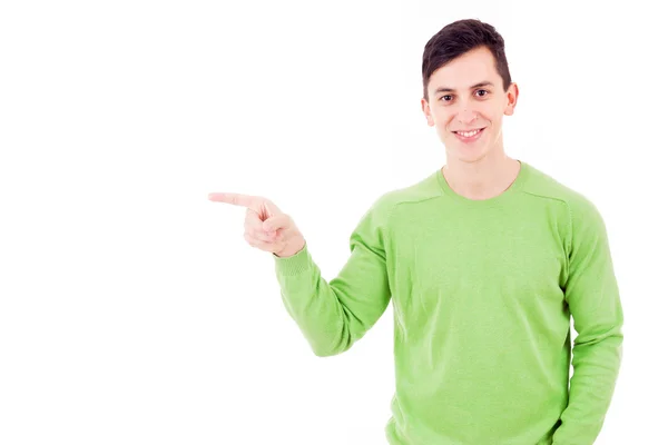 Glada leende ung man pekar mot copyspace, isolerad på — Stockfoto