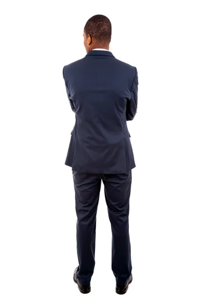 Young business man from the back over a white background — Stock Photo, Image