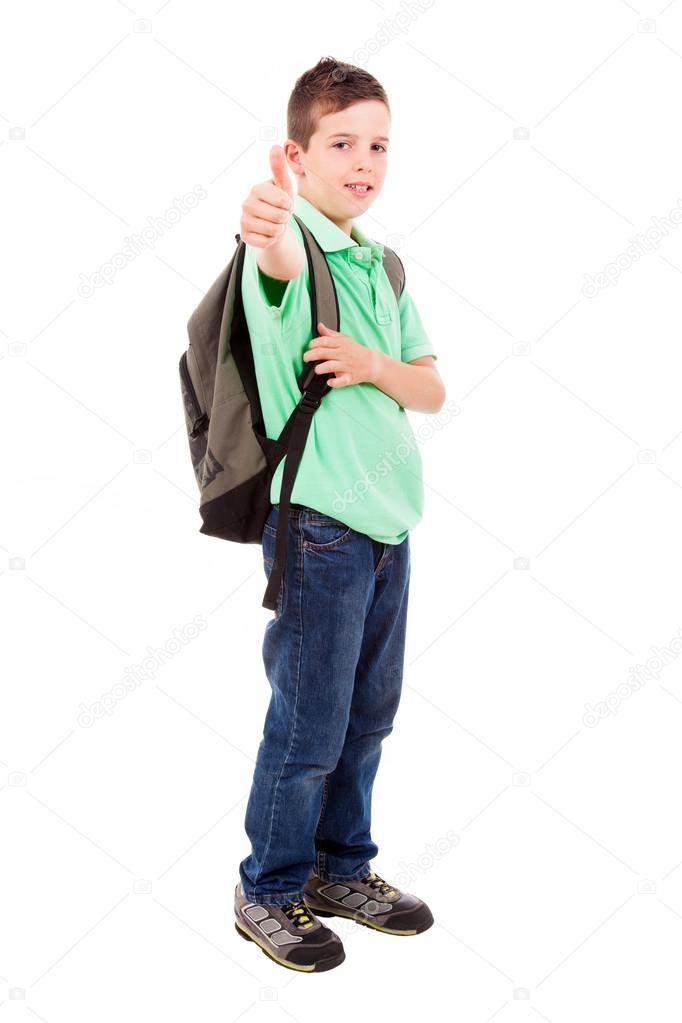 Full length portrait of a school boy with thumb up gesture, isol