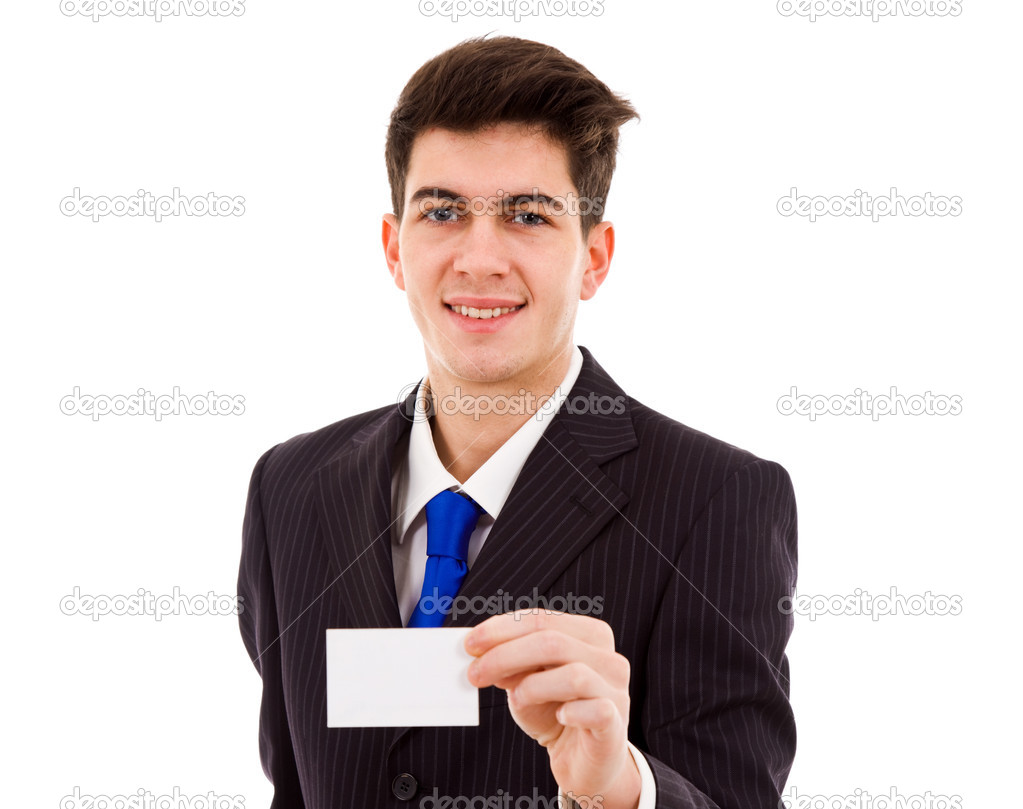 Young businessman with business card on white background