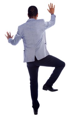 Beyaz bir arka plan üzerinde izole bir duvar - tırmanma işadamı