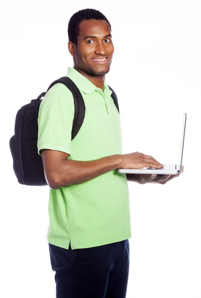 Afryki amerykański student posiadania laptopa - na białym tle nad odrobina — Zdjęcie stockowe