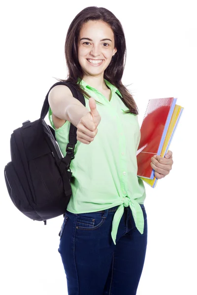 Boldog diáklány hüvelykujjával felfelé, a elszigetelt fehér háttér — Stock Fotó