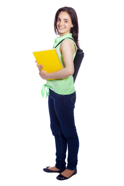 Happy female student carrying notebooks - isolated over a white — Stock Photo, Image