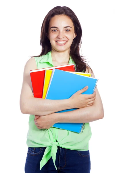 Jonge gelukkig vrouwelijke student uitvoering van boeken, geïsoleerd op witte bac — Stockfoto