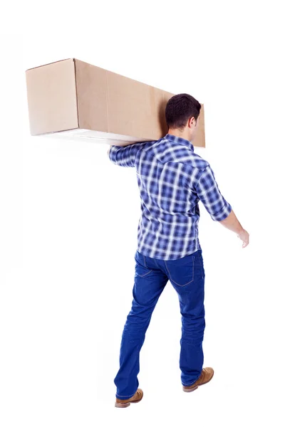 Hombre caminando y llevando una caja de cartón aislada sobre fondo blanco —  Fotos de Stock