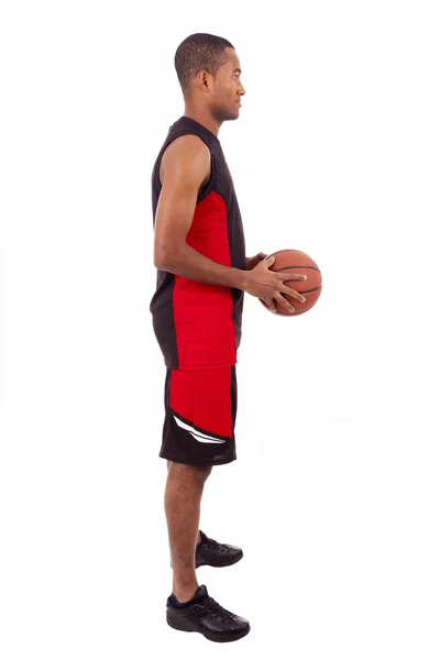 Side view of a basketball player isolated in white background — Stock Photo, Image