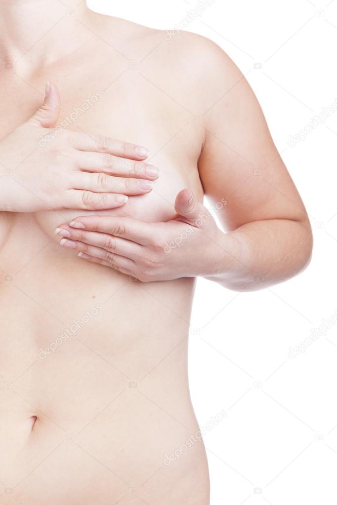 Woman examining breast, isolated on white