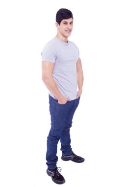 Beyaz bir arka plan üzerinde izole yakışıklı latin adam tam uzunlukta,