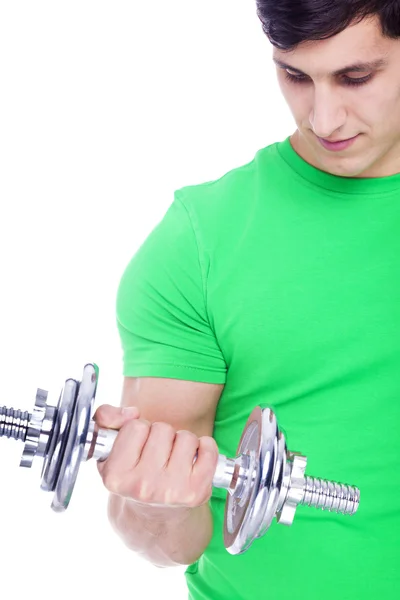 Portrait of a young athletic man lifting weights, isolated over — Stock Photo, Image