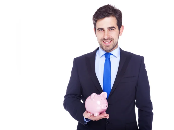 Empresário segurando um banco porquinho, isolado em um fundo branco — Fotografia de Stock
