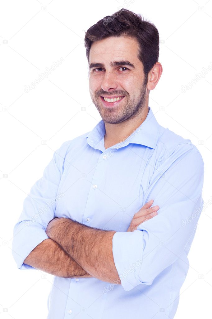 Handsome latin man smiling with arms crossed, isolated over a wh