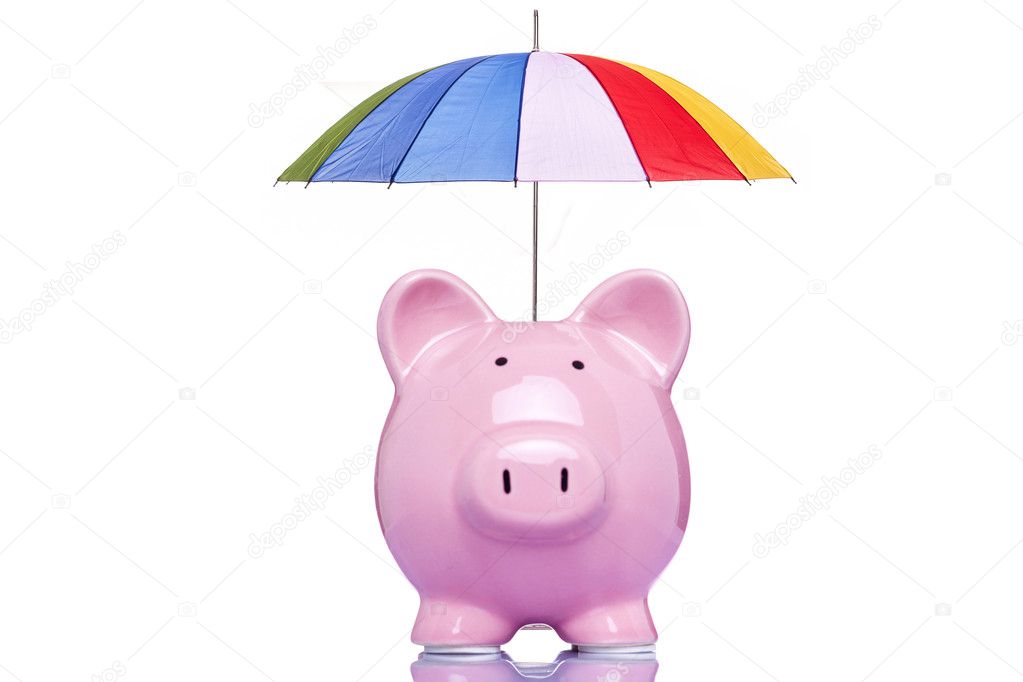 Piggy bank with a multicolored umbrella, isolated on a white bac