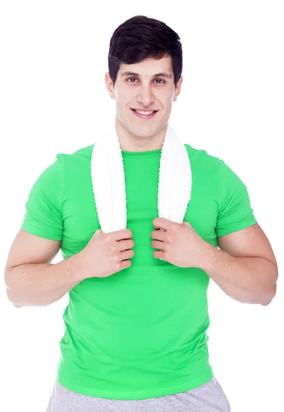 Retrato de un atlético sosteniendo una toalla, aislado sobre un blanco — Foto de Stock