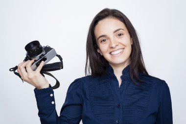 bir kamera tutan kadın fotoğrafçı