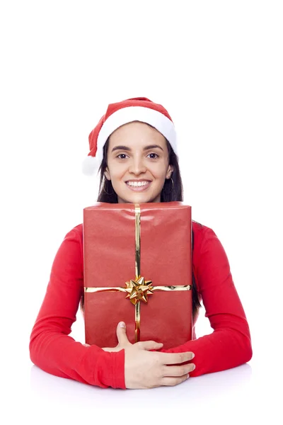 Felice Santa ragazza che abbraccia un regalo — Foto Stock