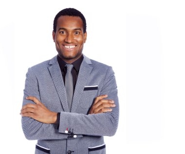Portret van een glimlachende jonge Afrikaanse business man, geïsoleerd op wh