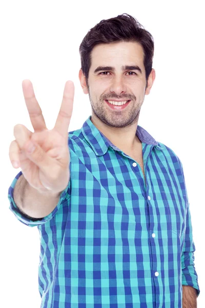 Handsome man giving the victory sign, isolated on white backgrou — Stock Photo, Image