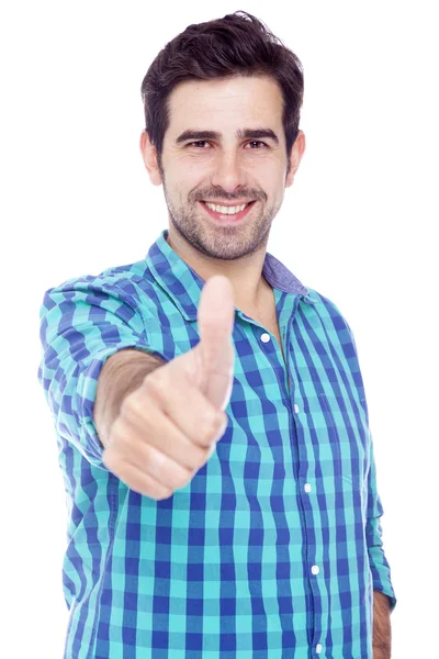 Handsome latin man thumbs up over a white background Stock Image