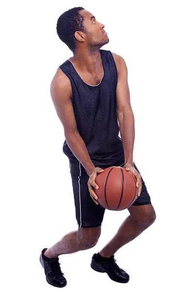 Basketball player with a ball, isolated on a white background — Stock Photo, Image