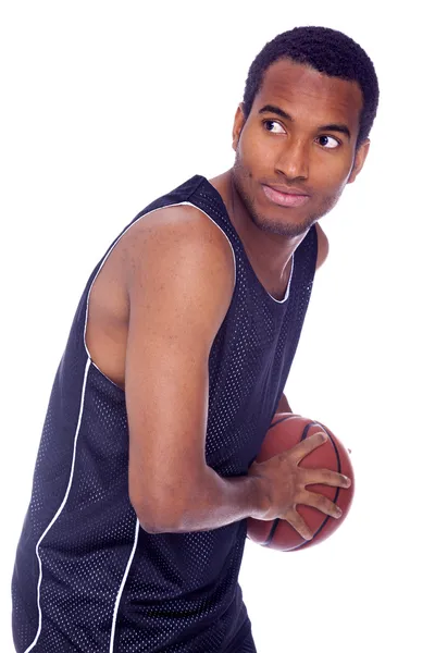 Basketbolcu ile top, beyaz bir arka plan üzerinde izole — Stok fotoğraf