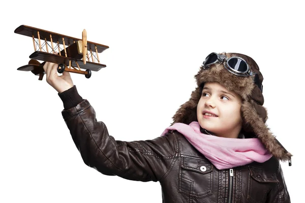 Happy child playing with toy airplane — Stock Photo, Image