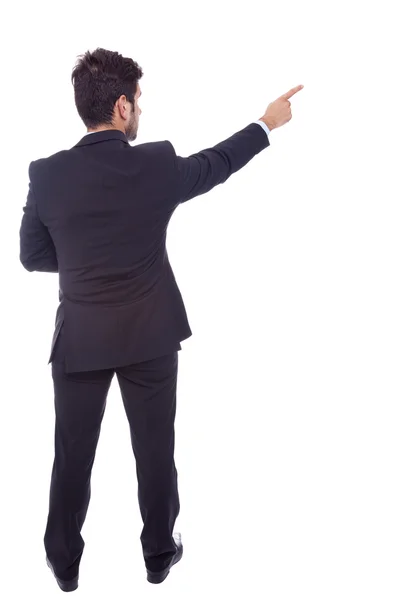 Business man pointing at something, isolated on white backgroun Stock Photo