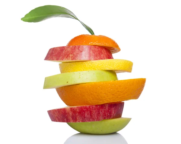 Stack of sliced fresh fruit, isolated on white background — Stock Photo, Image