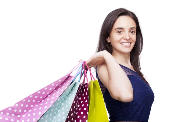 Retrato de uma mulher bonita com sacos de compras, isolado no wh — Fotografia de Stock