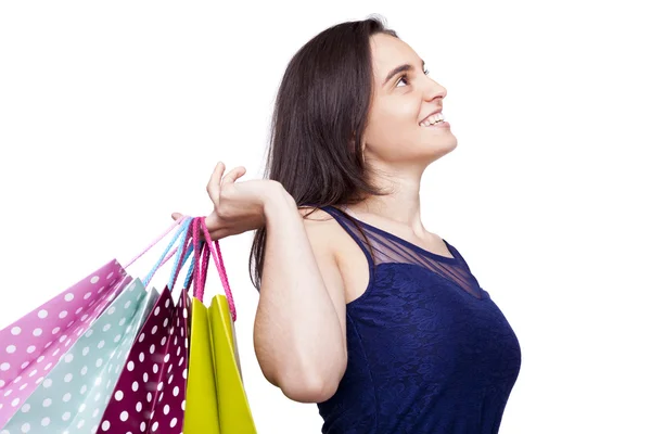 Retrato de uma mulher bonita com sacos de compras, isolado no wh — Fotografia de Stock
