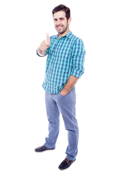 Handsome man thumbs up over a white background — Stock Photo, Image