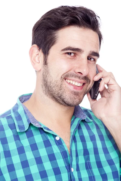 Красивый мужчина разговаривает по мобильному телефону — стоковое фото