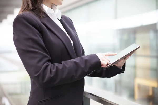 Businesswoman working with a digital tablet — Stock Photo, Image