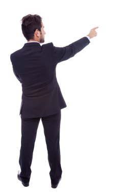 bir şeye işaret eden iş adamı