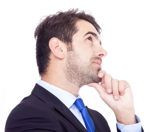 Pensive business man looking up — Stock Photo, Image