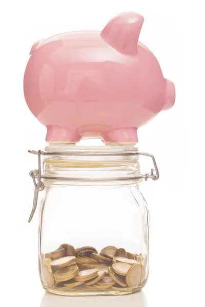 Piggy bank and money jar on white background — Stock Photo, Image