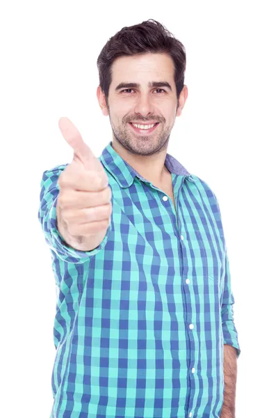 Handsome latin man thumbs up over a white background — Stock Photo, Image