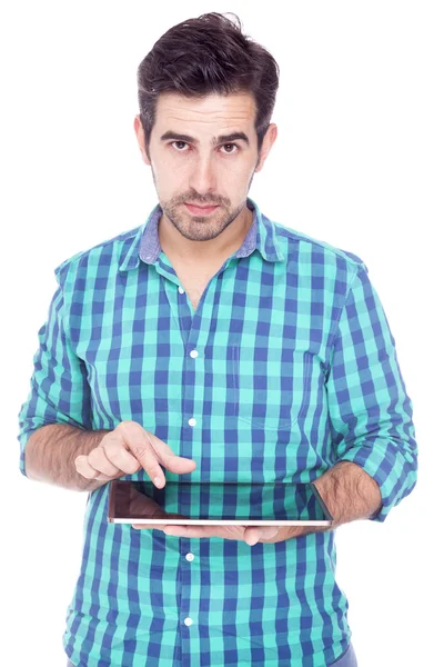 Hombre latino guapo usando una tableta, aislado sobre un blanco — Foto de Stock