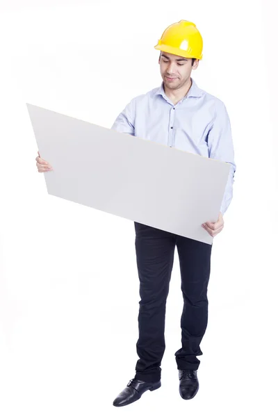 Ingeniero guapo sosteniendo planos, aislado en blanco — Foto de Stock