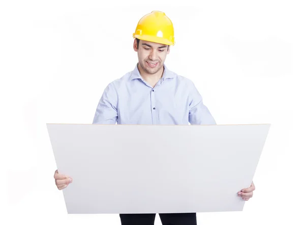 Ingeniero guapo sosteniendo planos, aislado en blanco —  Fotos de Stock