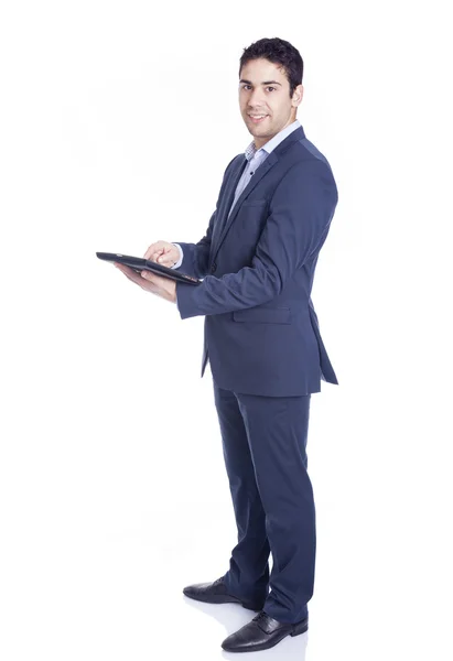 Całe ciało portret przystojny biznesmen przy użyciu komputera typu tablet, — Zdjęcie stockowe