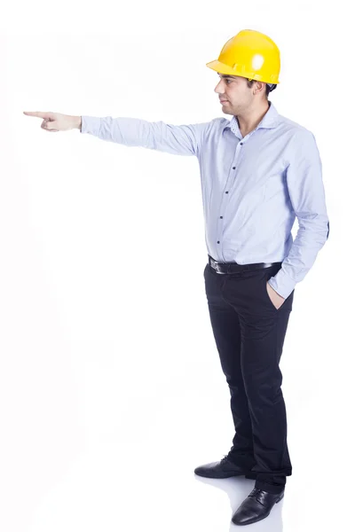Engineer pointing at something, isolated on white — Stock Photo, Image