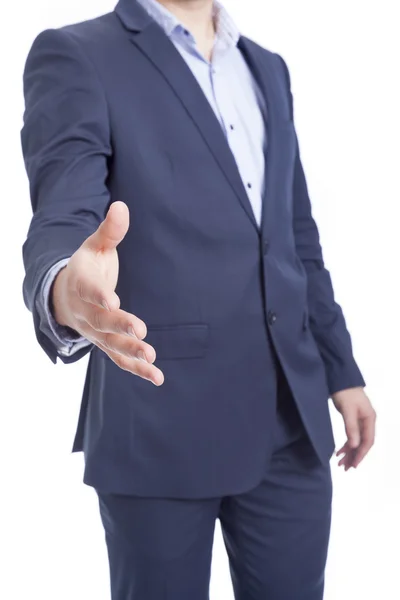 Hombre de negocios con la mano extendida listo para apretón de manos — Foto de Stock