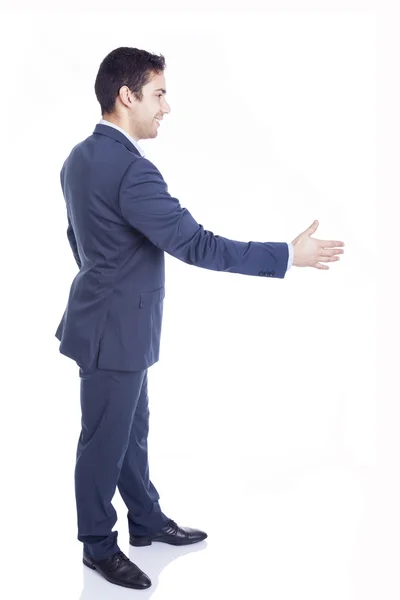 Business man with hand extended ready to handshake — Stock Photo, Image