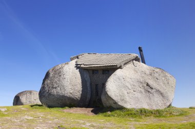 Stone house in the top of a mountain near Guimaraes, Fafe Portug clipart