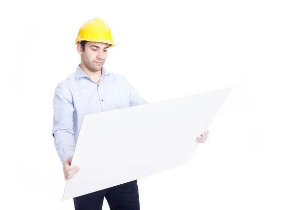 Ingeniero guapo sosteniendo planos, aislado en blanco —  Fotos de Stock