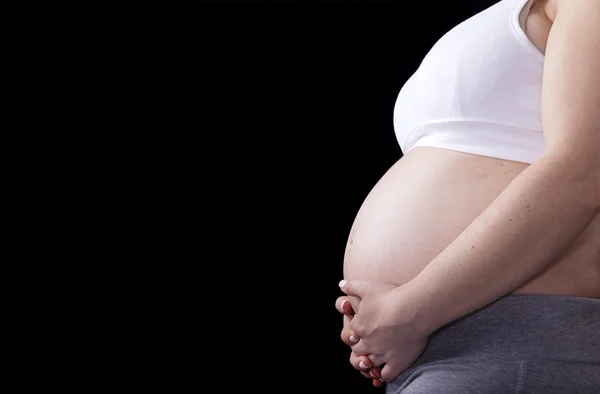 Hamile bir kadının karnı. — Stok fotoğraf