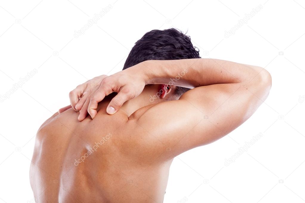 Muscular man holding his back